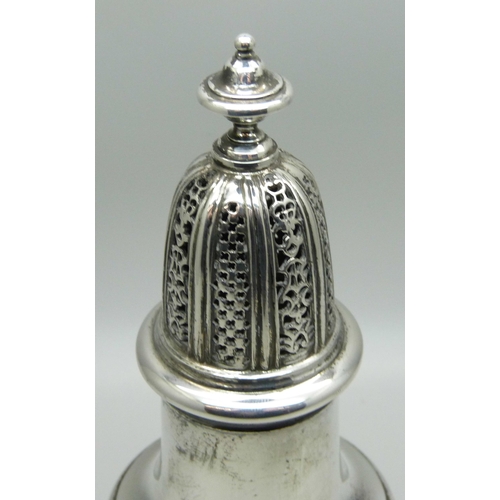 831 - A Georgian style silver castor, London 1957, William Comyns & Sons Ltd., (R.C), 235g