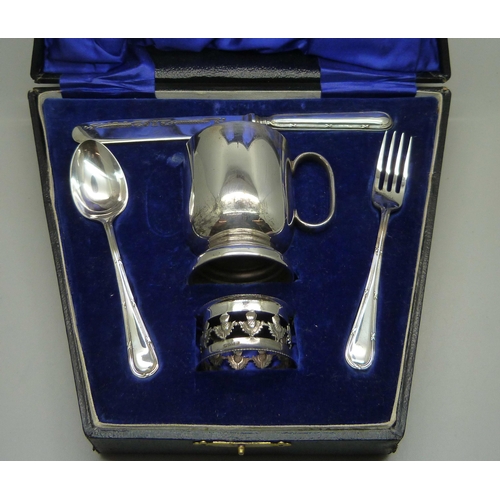 832 - A cased plated christening set