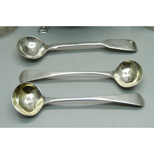 841 - A silver sauce boat, two silver napkin rings, a pair of silver mustard spoons and one other silver m... 