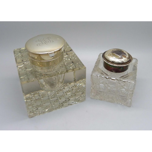 842 - Two silver topped glass inkwells