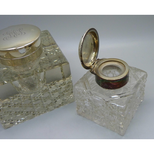 842 - Two silver topped glass inkwells