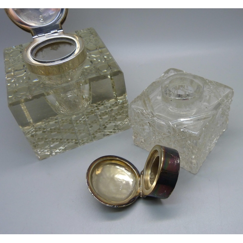 842 - Two silver topped glass inkwells