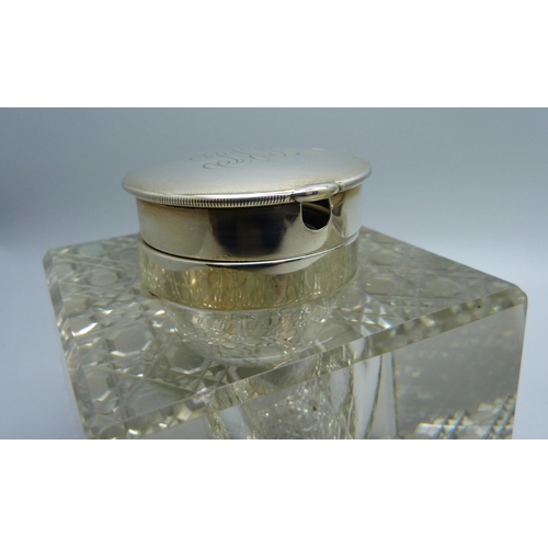 842 - Two silver topped glass inkwells