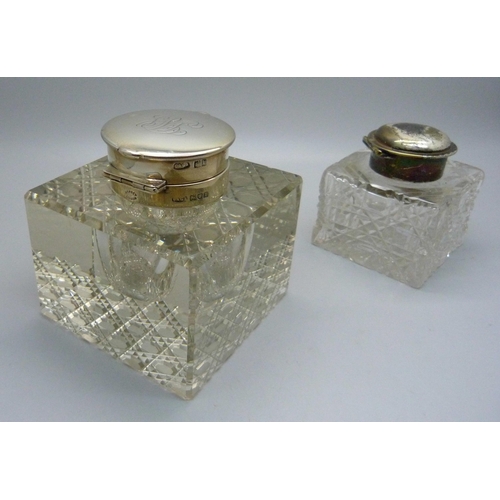 842 - Two silver topped glass inkwells