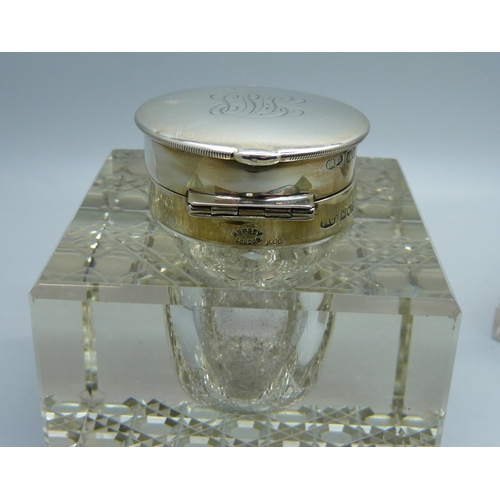 842 - Two silver topped glass inkwells