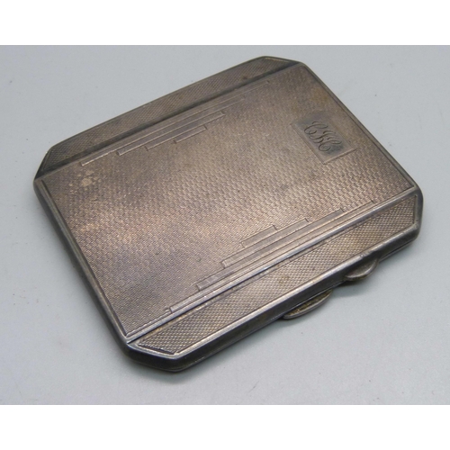 844 - A silver Art Deco cigarette case, 115g