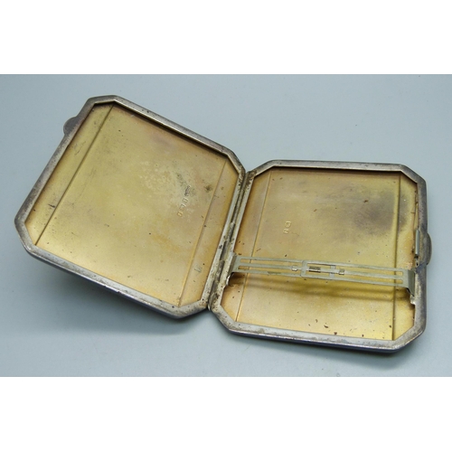 844 - A silver Art Deco cigarette case, 115g