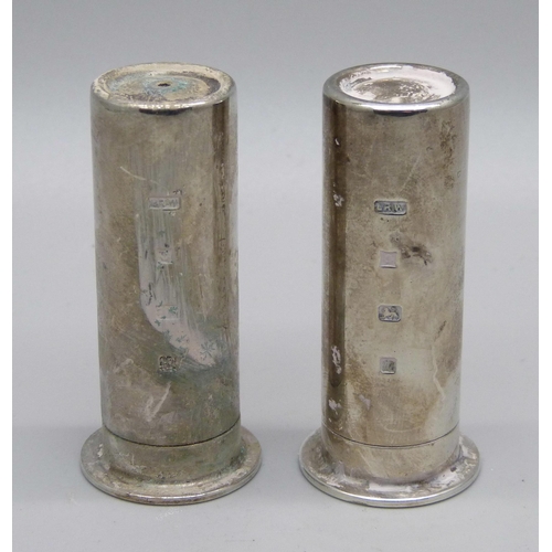 847 - A novelty silver shotgun cartridge style salt and pepper pair, Birmingham 1996, 64g