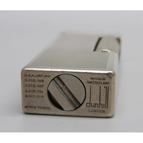 851 - A vintage silver plated Dunhill lighter with engine turned detail