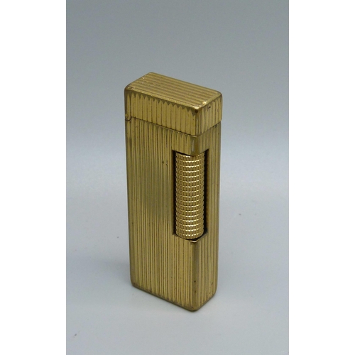 852 - A gold plated Dunhill lighter