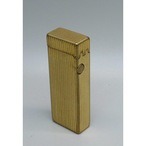 852 - A gold plated Dunhill lighter