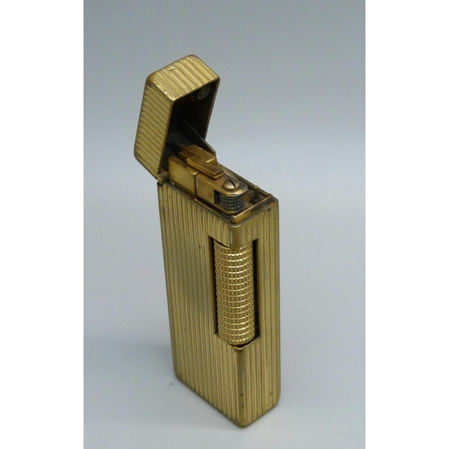 852 - A gold plated Dunhill lighter