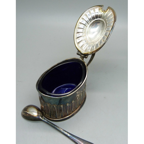 856 - A Victorian silver mustard, 48g, (plated spoon), an Indian white metal jug with snake handle, 102g, ... 