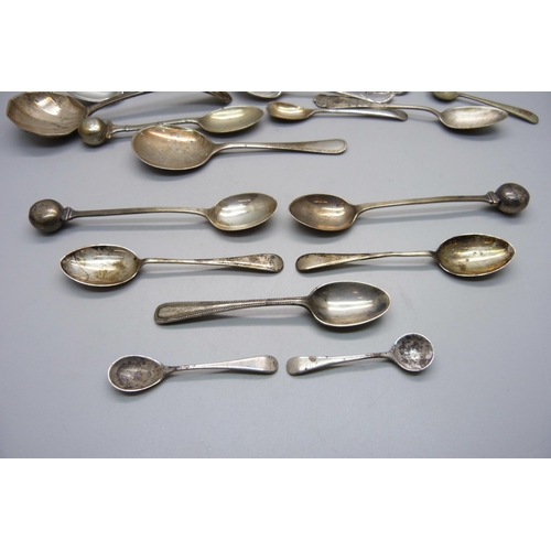 861 - Five silver spoons, two silver mustard spoons and other plated spoons, 70g of silver