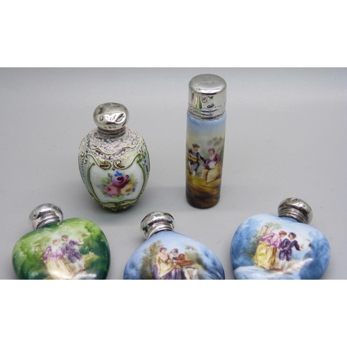 862 - A collection of seven hand painted continental scent bottles with hallmarked silver lids, all lids d... 