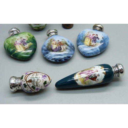 862 - A collection of seven hand painted continental scent bottles with hallmarked silver lids, all lids d... 