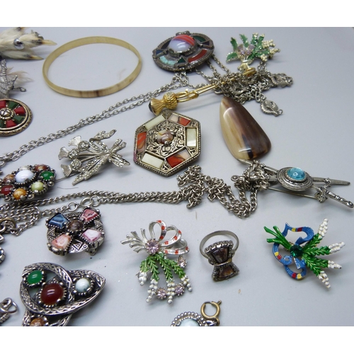 872 - Jewellery including Scottish brooches, bangles, etc.