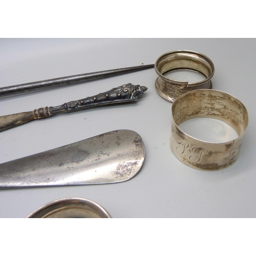 875 - A set of six silver napkin rings, one a/f, three other silver napkin rings, three silver handled imp... 