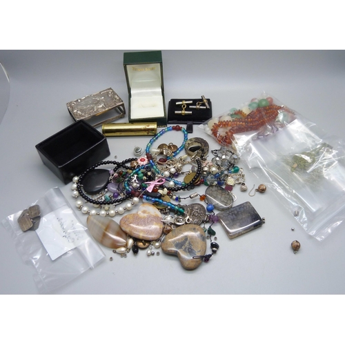 877 - A silver matchbox holder and rattle, both a/f, and a collection of costume jewellery