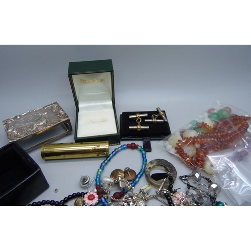 877 - A silver matchbox holder and rattle, both a/f, and a collection of costume jewellery