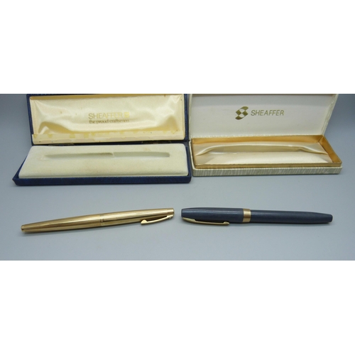 878 - Two boxed Sheaffer pens, one with 14ct gold nib and '12k G.F.' body and cap