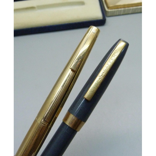 878 - Two boxed Sheaffer pens, one with 14ct gold nib and '12k G.F.' body and cap