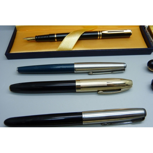 881 - A Conway Stewart Dinkie 540 set with 14ct gold nib, boxed, three Parker 51 fountain pens, all three ... 