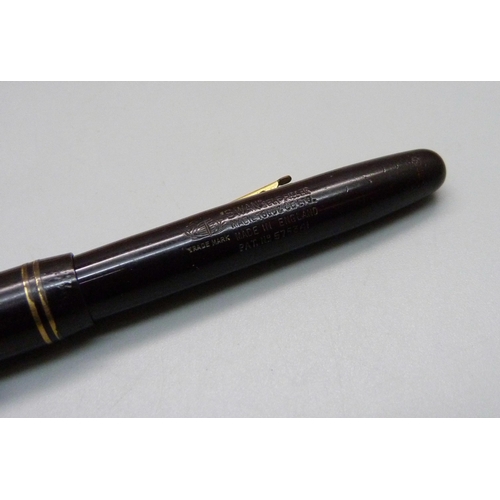 883 - A Swan pen with 14ct gold nib, (Parker box)