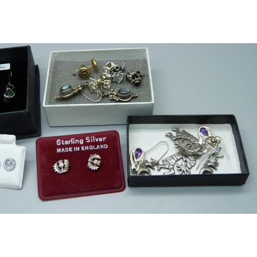 896 - Eighteen pairs of silver earrings