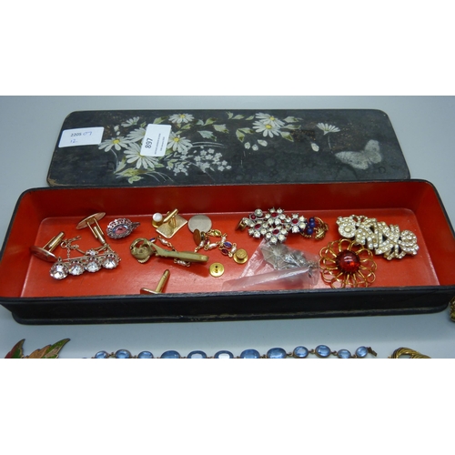 897 - Enamelled and other jewellery in a lacquered glove box, including blue stone necklet and bracelet, l... 