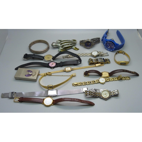 898 - A silver bangle and lady's wristwatches