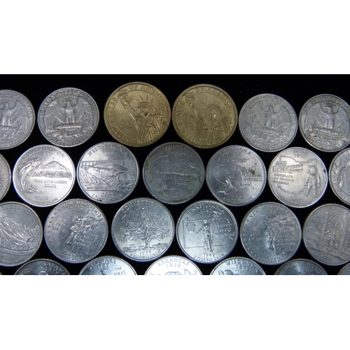 905 - A collection of 106 United States quarter dollar coins; 92 State quarters, eleven eagle quarters inc... 