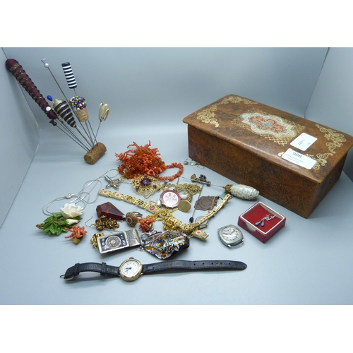 908 - A box of jewellery including amber, coral, silver, hat pins, etc.