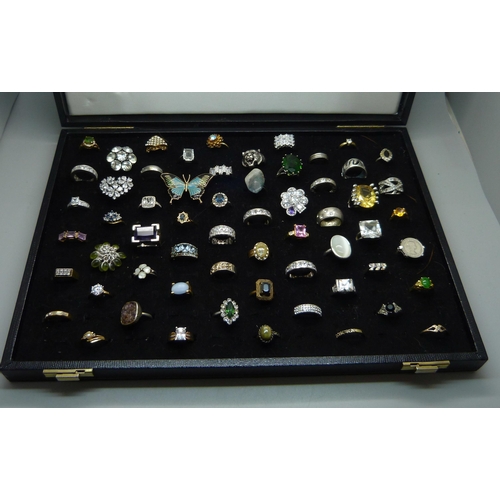 927 - A ring tray and sixty costume rings