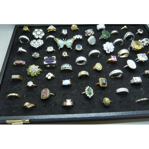 927 - A ring tray and sixty costume rings