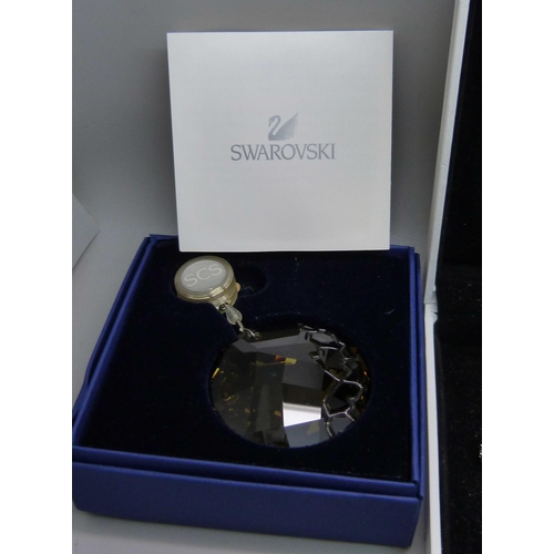 929 - A Swarovski collarette and earrings, boxed and two Swarovski crystal hanging ornaments