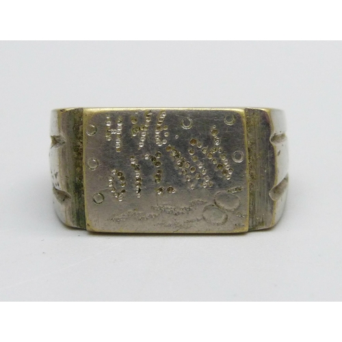 937 - A WWII related ring engraved Anzio 1944, size U