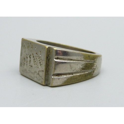 937 - A WWII related ring engraved Anzio 1944, size U