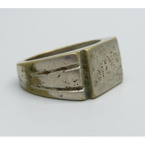 937 - A WWII related ring engraved Anzio 1944, size U