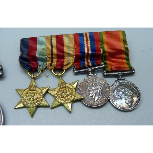 948 - A set of four WWII medals and miniatures including Africa Service Medal to 4221 K.O. Abbot