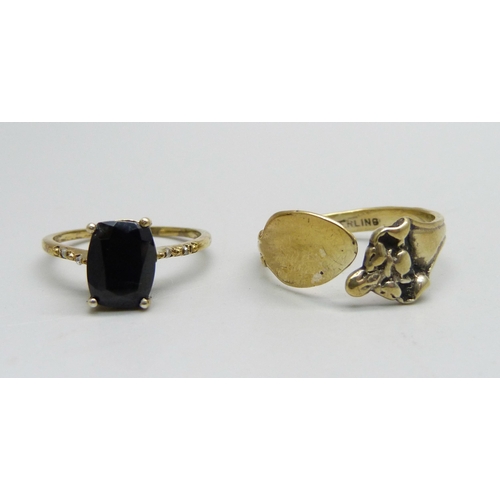 950 - Two silver gilt rings including black stone set with diamond shoulders, S and O