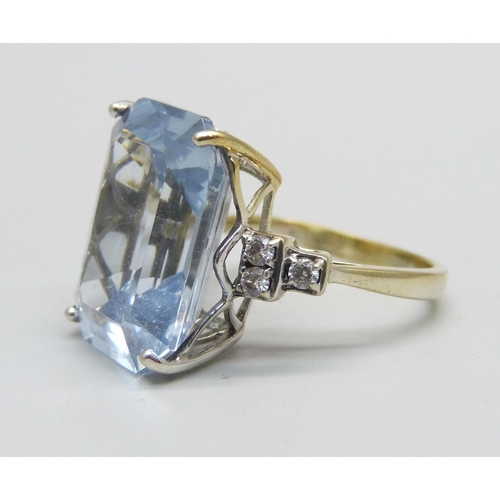 954 - A silver gilt and large blue stone ring, M