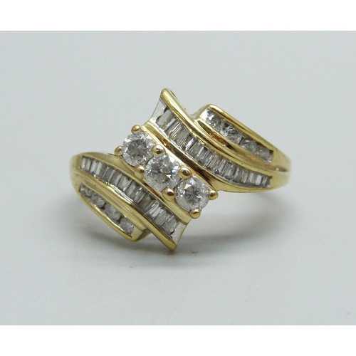 957 - A 9ct gold and diamond ring, 3.1g, N/O