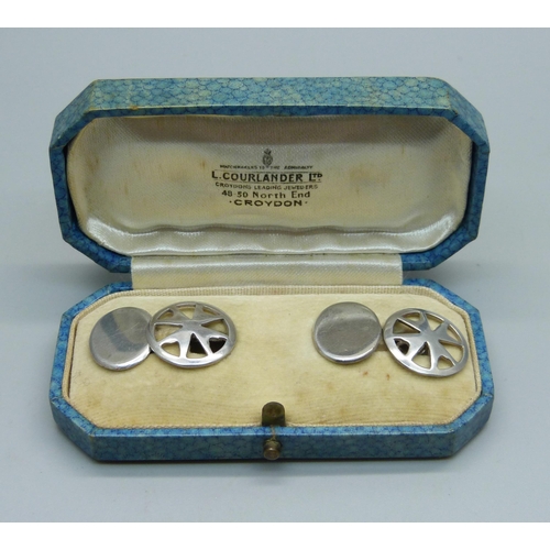 967 - A cased pair of Maltese silver cufflinks