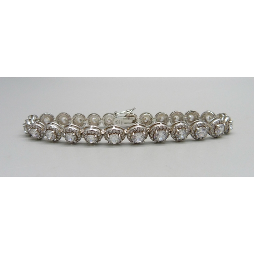 979 - A silver and CZ tennis bracelet