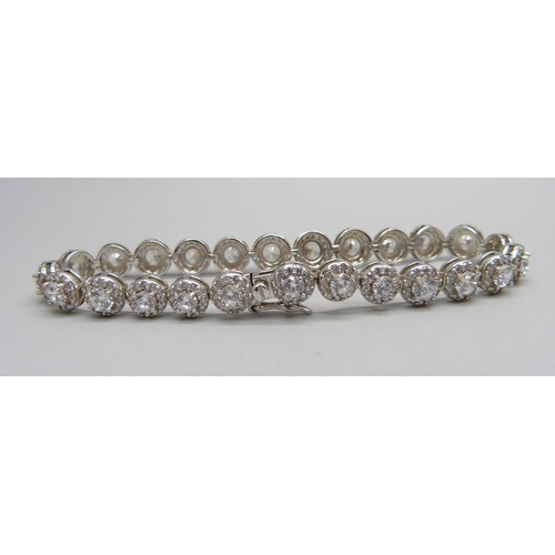 979 - A silver and CZ tennis bracelet