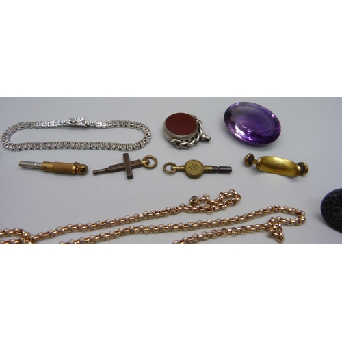 999 - An early 20th Century lighter, chains, swivel fob, stone set bracelet, watch keys, etc.