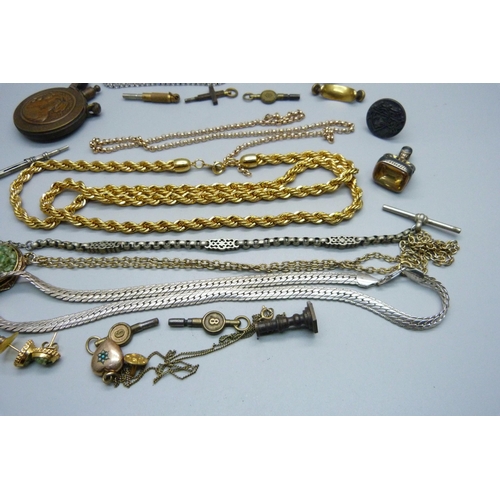 999 - An early 20th Century lighter, chains, swivel fob, stone set bracelet, watch keys, etc.