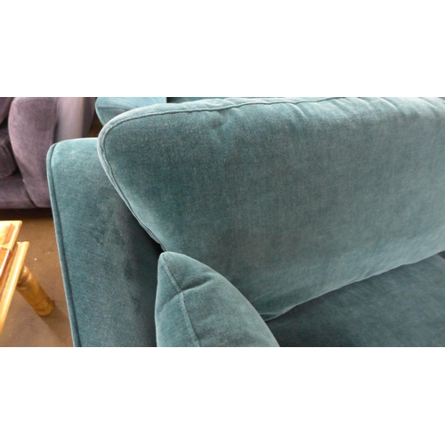 1403 - A turquoise velvet three seater sofa and two armchairs - damaged frame on sofa