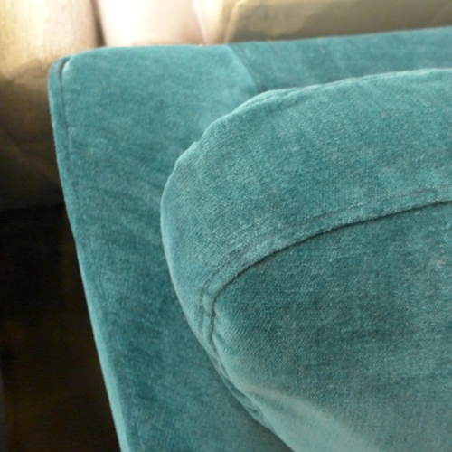 1403 - A turquoise velvet three seater sofa and two armchairs - damaged frame on sofa